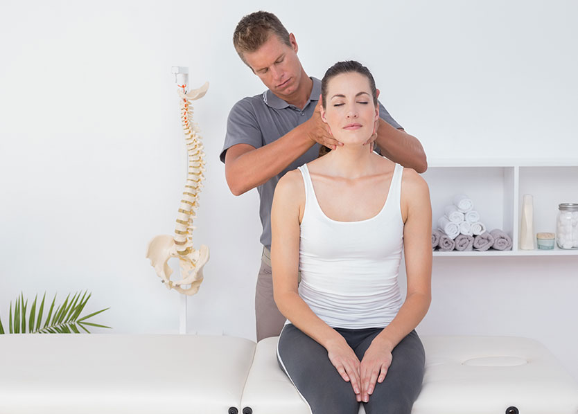Image of a woman getting an adjustment